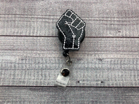 Black Fist Badge Reel