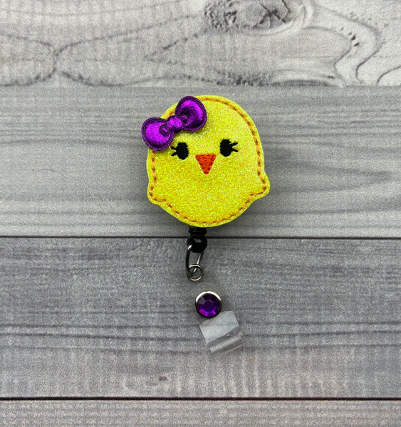 Chick with Bow Badge Reel