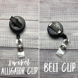 Skeleton w/ Bow Badge Reel