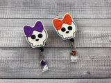 Skeleton w/ Bow Badge Reel