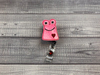 Pink Monster Love Badge Reel