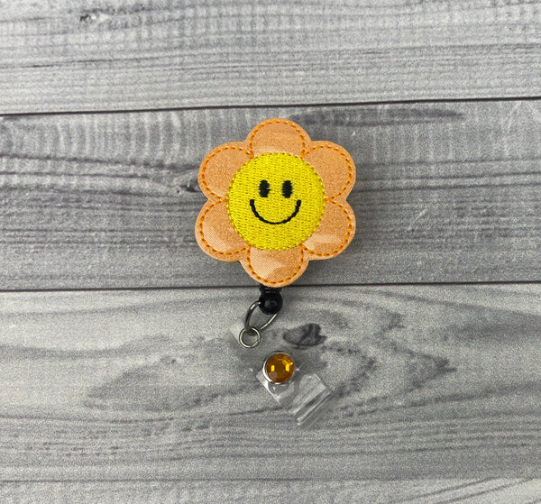 Smiling Flower Badge Reel